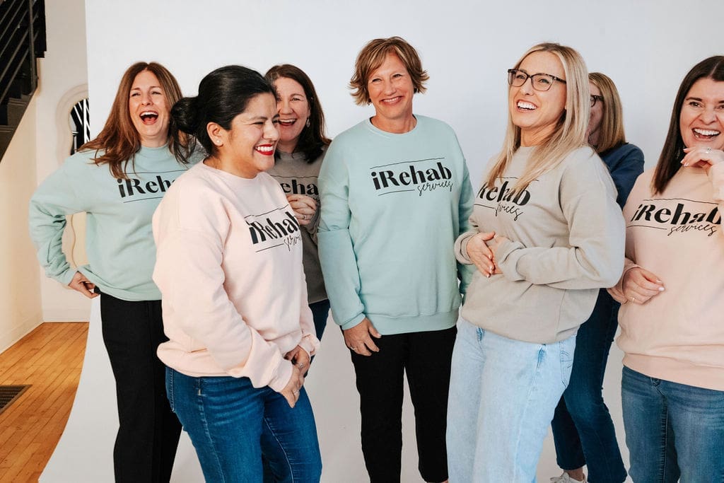 Several members of the iRehab team posing for a picture
